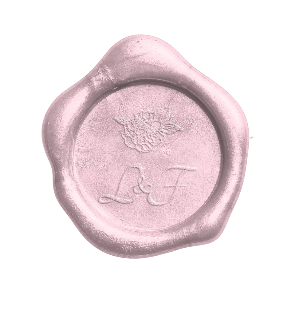 Pink wax seal with floral monogram used in The Modern Invite Romantic Garden digital wedding invitation